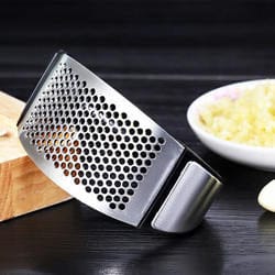 Roestvrij stalen knoflookpers